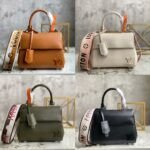 Louis Vuitton Cluny Mini 20cm Epi Leather Handbag with Reversible Jacquard Strap 36