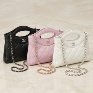 CHANEL Quilted Leather Small Top Handle Bag with Distinctive Cut-out Handles and Versatile Chain Strap 20cm