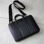 Gucci Signature Black Leather Slim Briefcase Men’s Embossed Calfskin Business Laptop Bag with Palladium-Toned Hardware 1