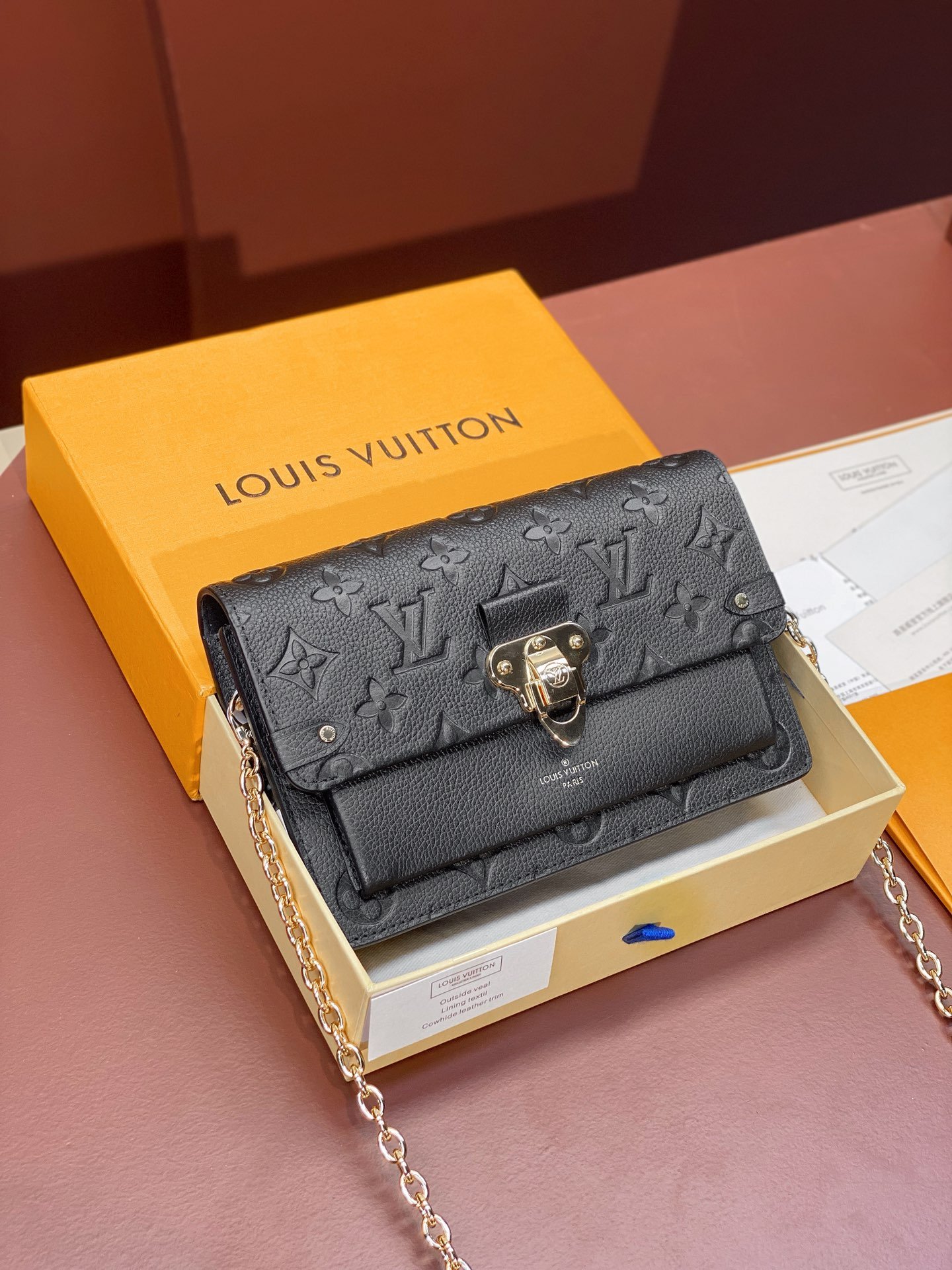 Louis Vuitton Monogram Empreinte Leather Chain Wallets The Ultimate Fusion of Heritage and Modern Elegance 10