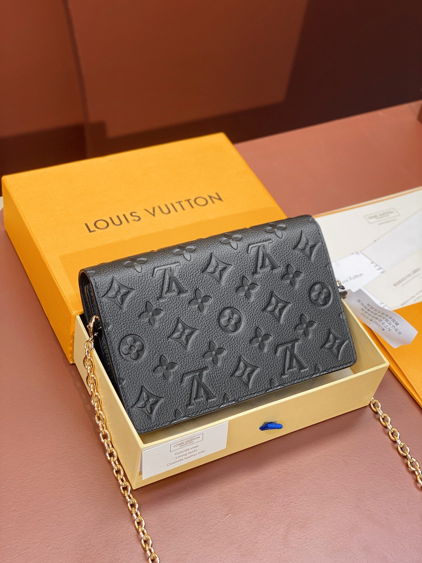 Louis Vuitton Monogram Empreinte Leather Chain Wallets The Ultimate Fusion of Heritage and Modern Elegance 11
