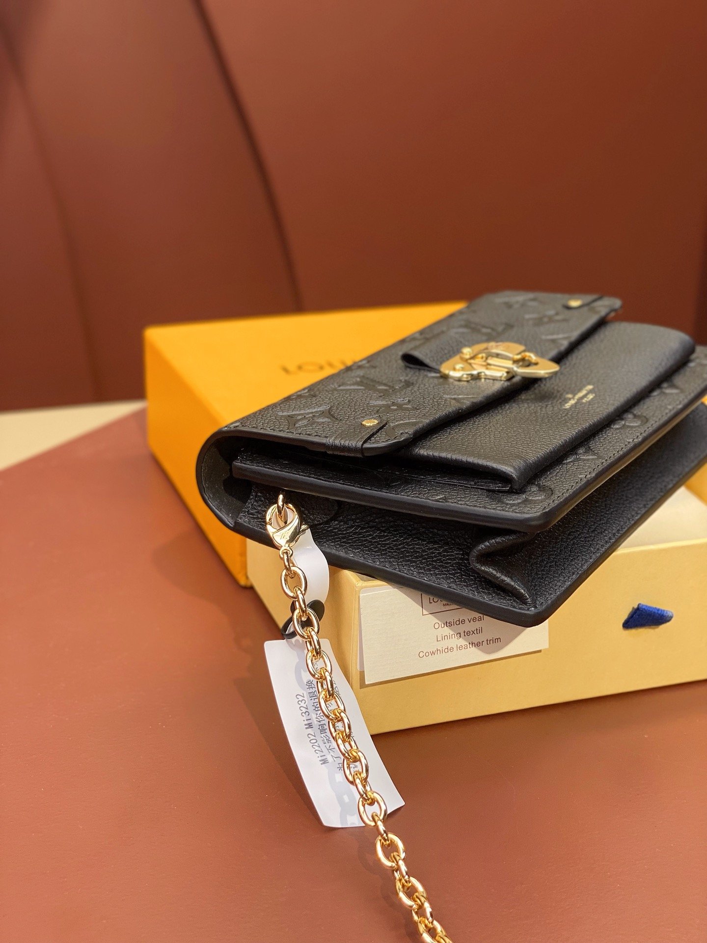 Louis Vuitton Monogram Empreinte Leather Chain Wallets The Ultimate Fusion of Heritage and Modern Elegance 13