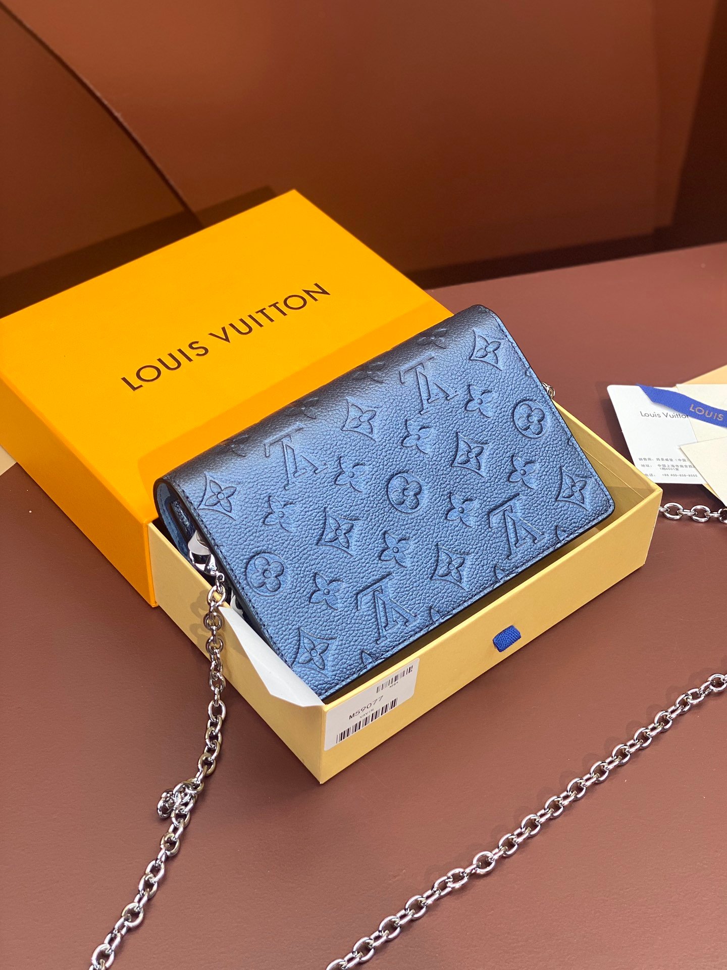 Louis Vuitton Monogram Empreinte Leather Chain Wallets The Ultimate Fusion of Heritage and Modern Elegance 2
