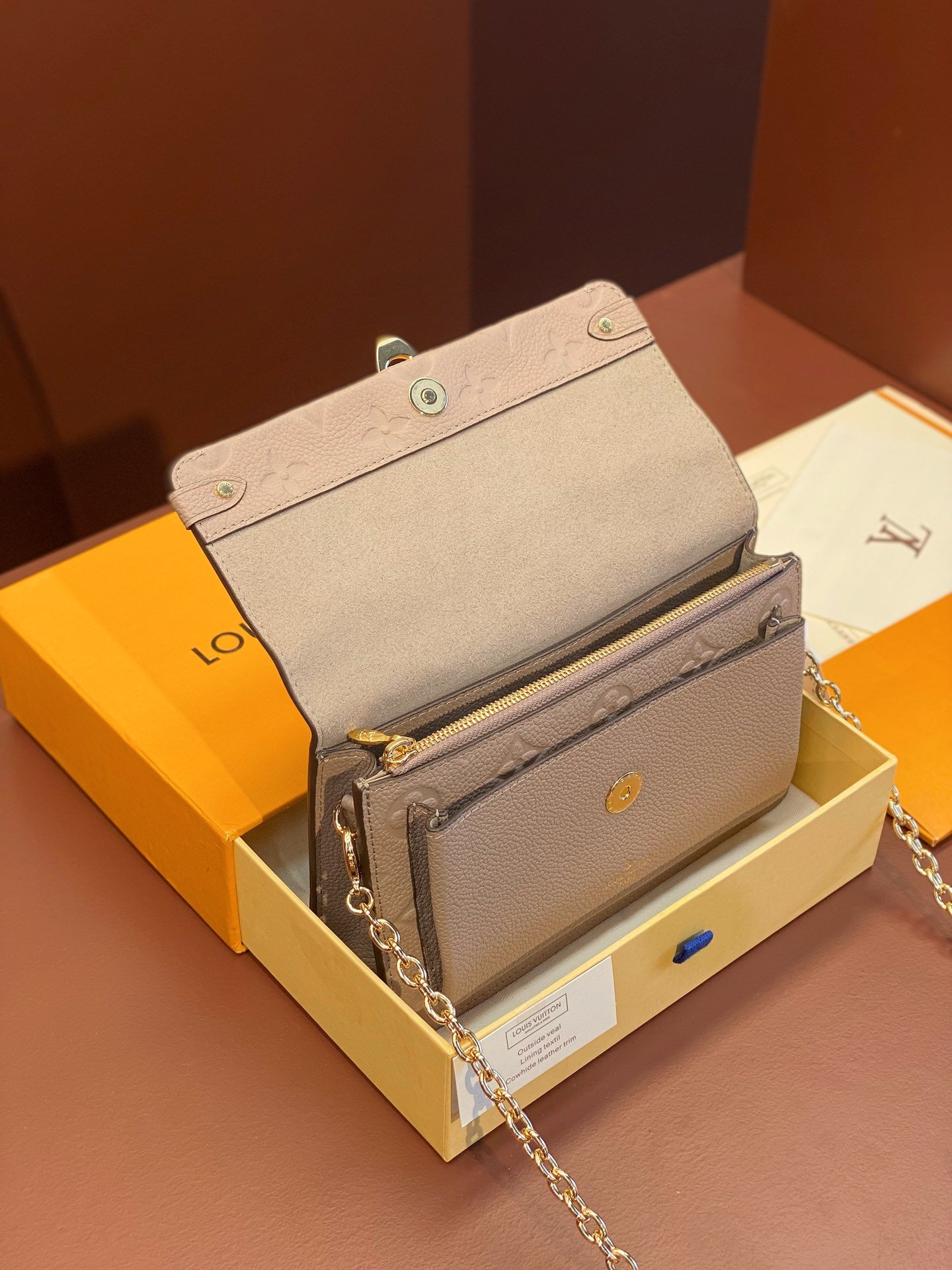 Louis Vuitton Monogram Empreinte Leather Chain Wallets The Ultimate Fusion of Heritage and Modern Elegance 23