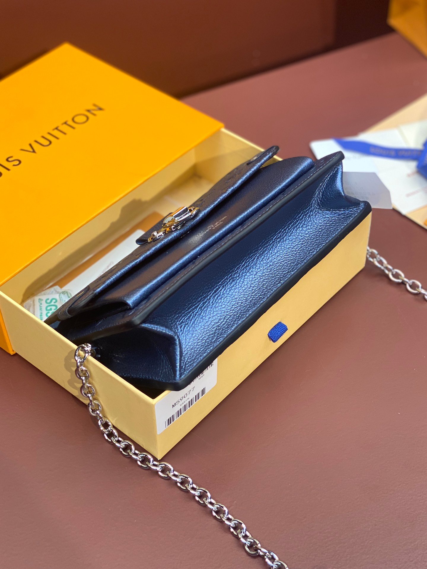 Louis Vuitton Monogram Empreinte Leather Chain Wallets The Ultimate Fusion of Heritage and Modern Elegance 3