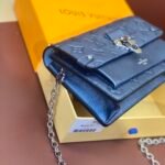 Louis Vuitton Monogram Empreinte Leather Chain Wallets The Ultimate Fusion of Heritage and Modern Elegance 4