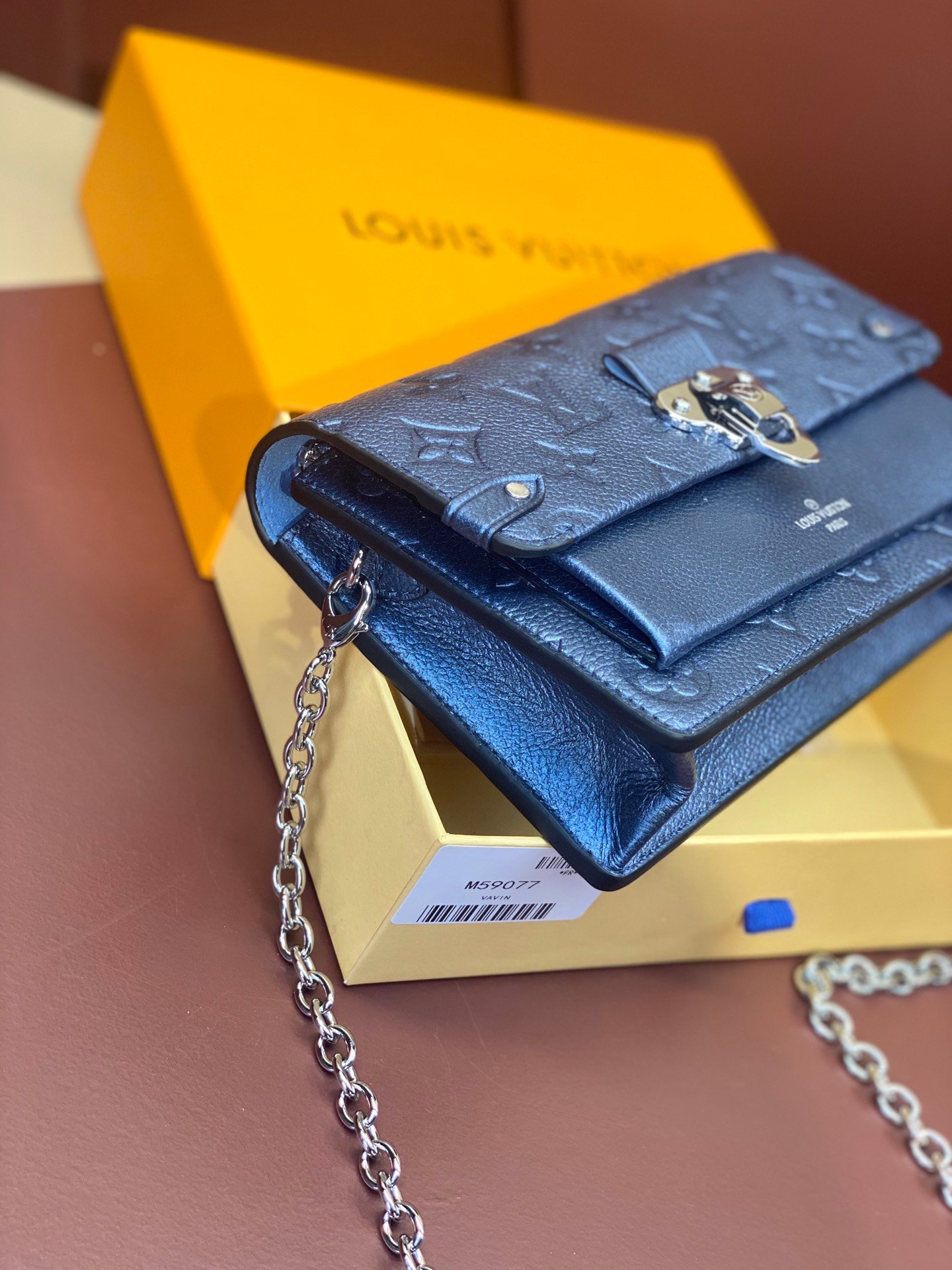 Louis Vuitton Monogram Empreinte Leather Chain Wallets The Ultimate Fusion of Heritage and Modern Elegance 4