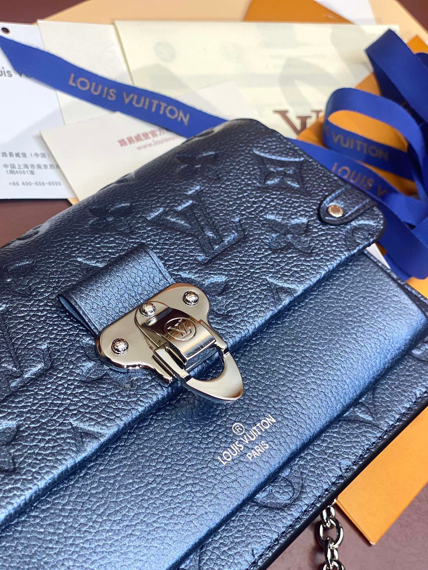 Louis Vuitton Monogram Empreinte Leather Chain Wallets The Ultimate Fusion of Heritage and Modern Elegance 7