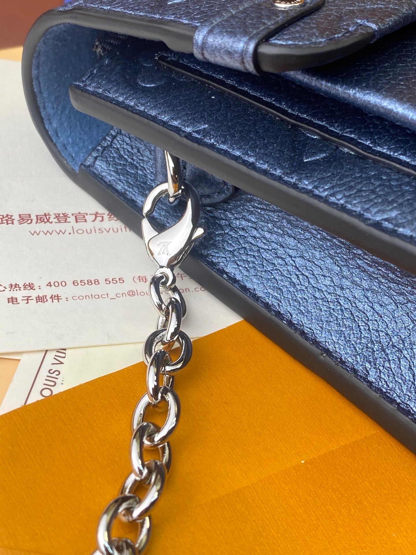Louis Vuitton Monogram Empreinte Leather Chain Wallets The Ultimate Fusion of Heritage and Modern Elegance 9
