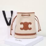 Premium Celine Triomphe Canvas and Leather Bucket Bag 25x28cm Vintage 3D Relief Logo Drawstring Shoulder Bag 1