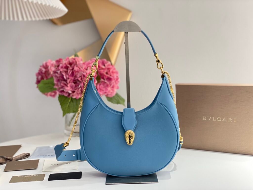 BVLGARI Serpenti Ellipse Large Crossbody Bag Calf Leather Crescent Shoulder Bag with Snakehead Closure 4 Colors – Image 1 BVLGARI Serpenti Ellipse Large Crossbody Bag Calf Leather Crescent Shoulder Bag with Snakehead Closure 4 Colors – Image 1
