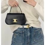 Celine Teen Lola Bag 22.5cm Shiny Calfskin Versatile Shoulder and Crossbody Bag with Gold-Tone Triomphe Clasp Celine Teen Lola Bag 22.5cm Shiny Calfskin Versatile Shoulder and Crossbody Bag with Gold-Tone Triomphe Clasp