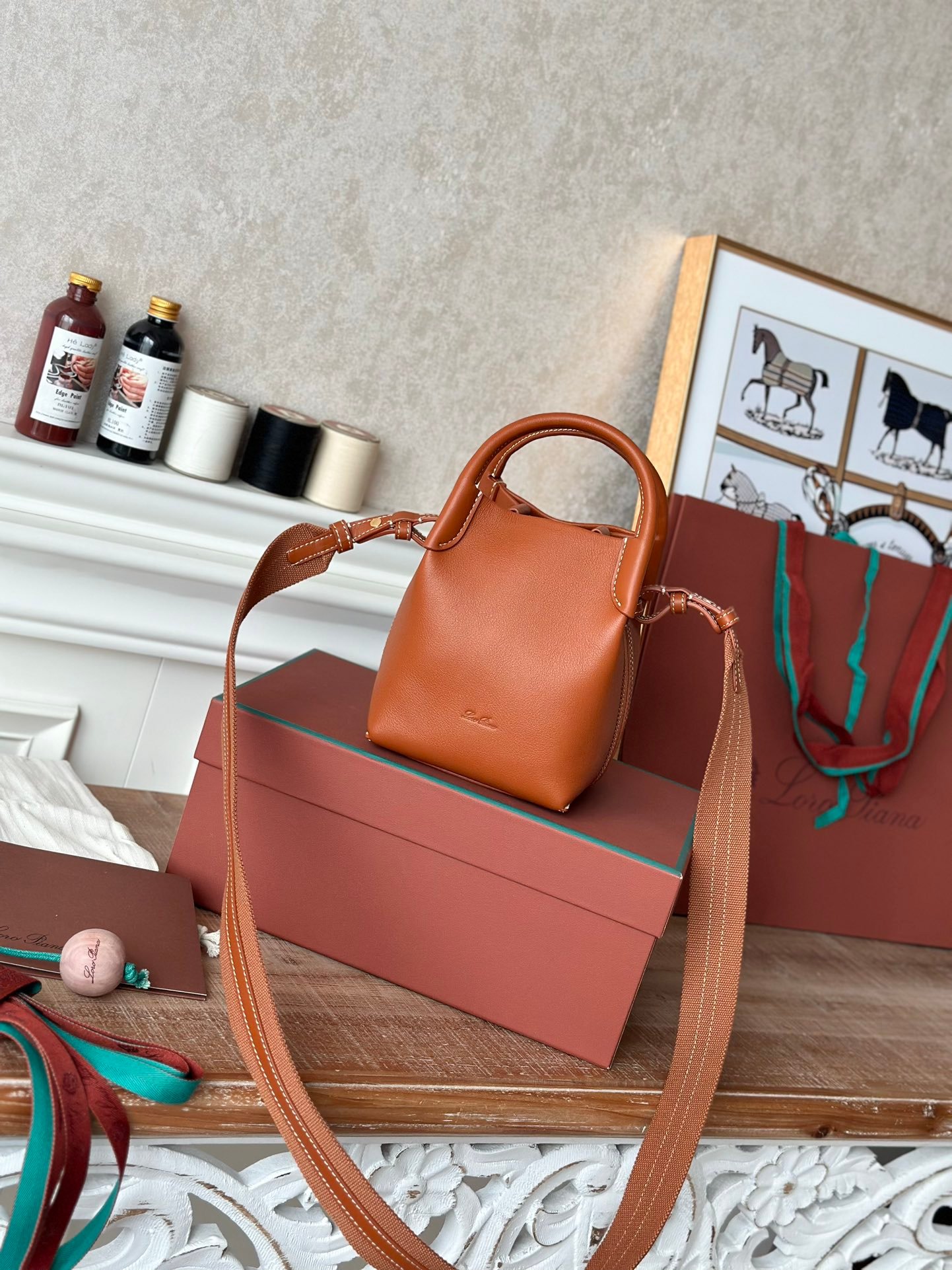 Loro Piana Mini Bale Bag 13x16x13cm Grained Calfskin Luxury Designer Mini Bucket Bag with Adjustable Crossbody Strap Loro Piana Mini Bale Bag 13x16x13cm Grained Calfskin Luxury Designer Mini Bucket Bag with Adjustable Crossbody Strap
