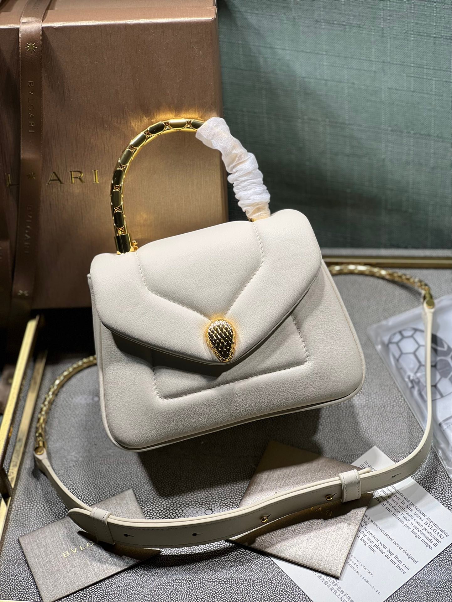 BVLGARI Serpenti Reverse Small Quilted Calfskin Top Handle Bag 20cm with Snake Metal Handle and Iconic Magnetic Chain Crossbody Strap BVLGARI Serpenti Reverse Small Quilted Calfskin Top Handle Bag 20cm with Snake Metal Handle and Iconic Magnetic Chain Crossbody Strap
