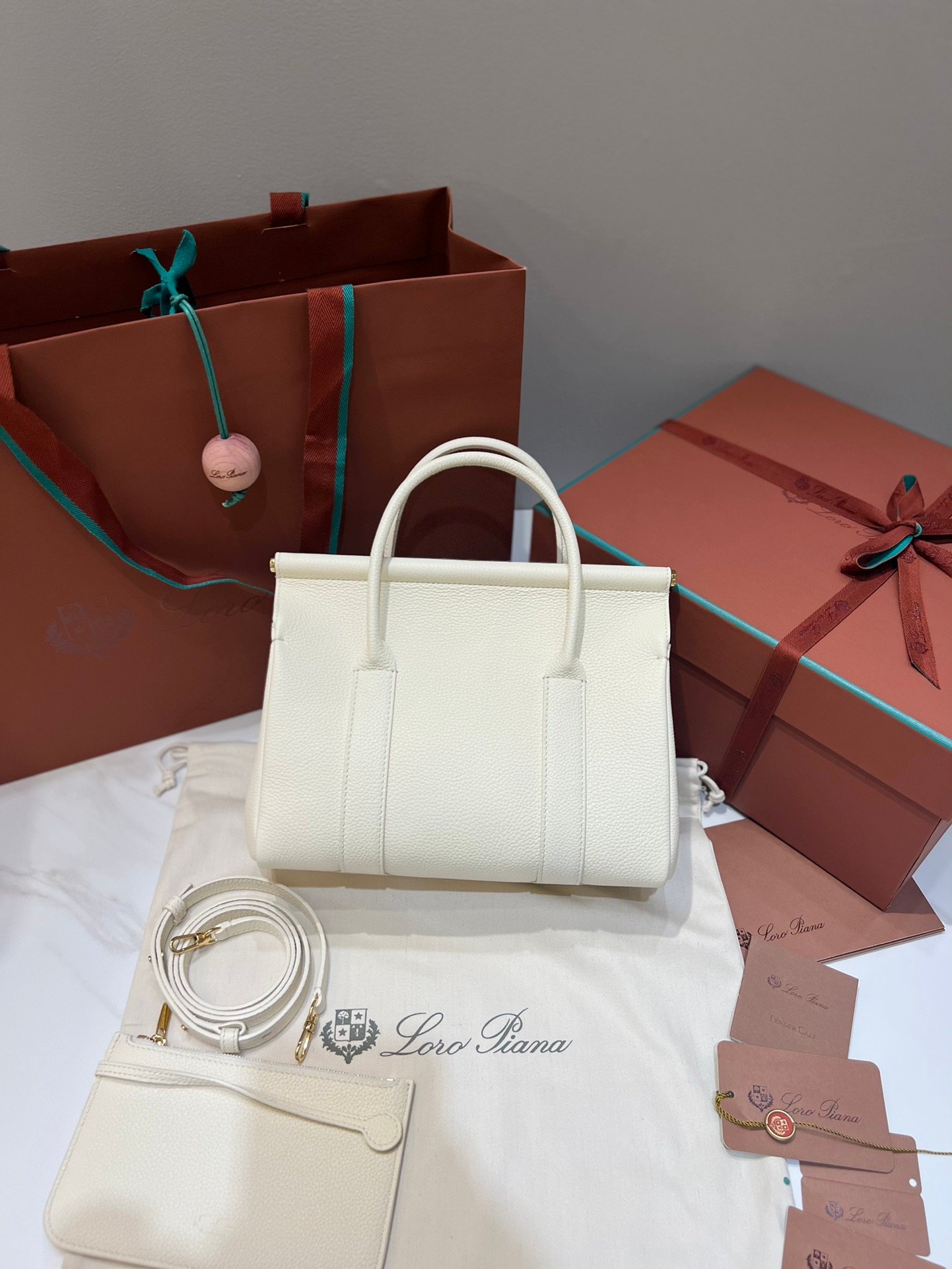 Loro Piana Loom L25 Handbag 25cm Tender Calfskin Leather Top-Handle Bag with Crossbody Strap and Iconic Padlock