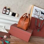 Loro Piana Mini Bale Bag 13x16x13cm Grained Calfskin Luxury Designer Mini Bucket Bag with Adjustable Crossbody Strap Loro Piana Mini Bale Bag 13x16x13cm Grained Calfskin Luxury Designer Mini Bucket Bag with Adjustable Crossbody Strap