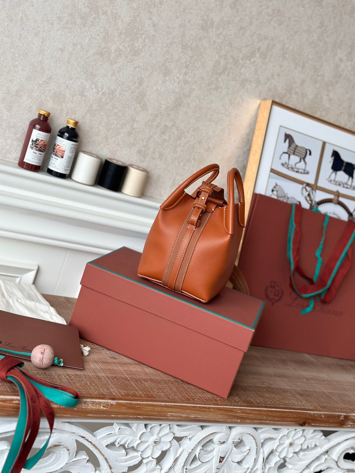 Loro Piana Mini Bale Bag 13x16x13cm Grained Calfskin Luxury Designer Mini Bucket Bag with Adjustable Crossbody Strap Loro Piana Mini Bale Bag 13x16x13cm Grained Calfskin Luxury Designer Mini Bucket Bag with Adjustable Crossbody Strap