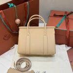 Loro Piana Loom L25 Grained Leather Handbag 25cm Top Handle Tote with Detachable Strap and Padlock Crossbody Bag for Women