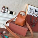 Loro Piana Mini Bale Bag 13x16x13cm Grained Calfskin Luxury Designer Mini Bucket Bag with Adjustable Crossbody Strap Loro Piana Mini Bale Bag 13x16x13cm Grained Calfskin Luxury Designer Mini Bucket Bag with Adjustable Crossbody Strap
