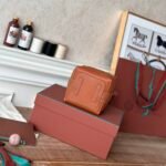 Loro Piana Mini Bale Bag 13x16x13cm Grained Calfskin Luxury Designer Mini Bucket Bag with Adjustable Crossbody Strap Loro Piana Mini Bale Bag 13x16x13cm Grained Calfskin Luxury Designer Mini Bucket Bag with Adjustable Crossbody Strap