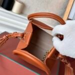 Loro Piana Mini Bale Bag 13x16x13cm Grained Calfskin Luxury Designer Mini Bucket Bag with Adjustable Crossbody Strap Loro Piana Mini Bale Bag 13x16x13cm Grained Calfskin Luxury Designer Mini Bucket Bag with Adjustable Crossbody Strap