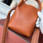 Loro Piana Mini Bale Bag 13x16x13cm Grained Calfskin Luxury Designer Mini Bucket Bag with Adjustable Crossbody Strap Loro Piana Mini Bale Bag 13x16x13cm Grained Calfskin Luxury Designer Mini Bucket Bag with Adjustable Crossbody Strap