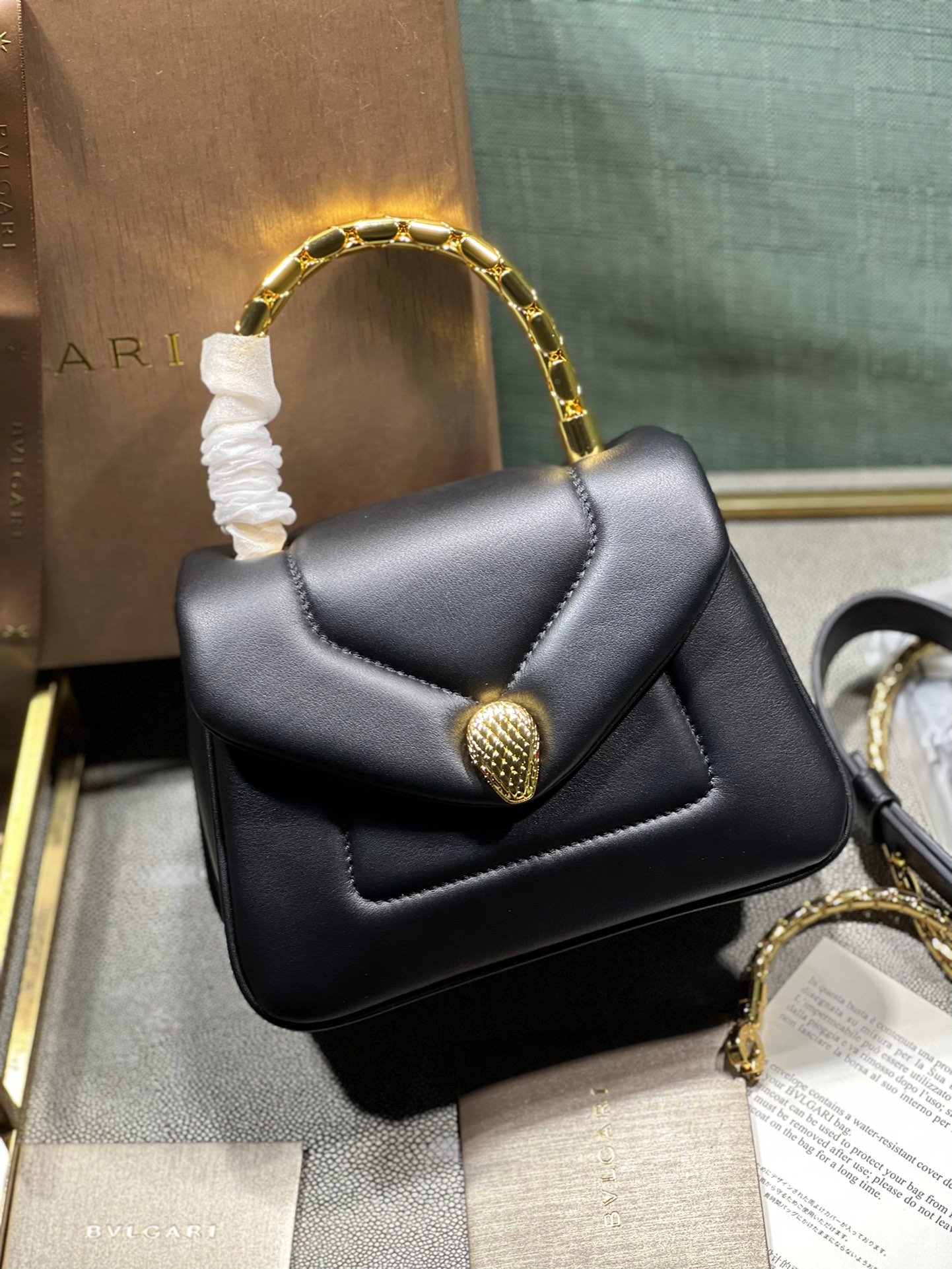 BVLGARI Serpenti Reverse Small Quilted Calfskin Top Handle Bag 20cm with Snake Metal Handle and Iconic Magnetic Chain Crossbody Strap BVLGARI Serpenti Reverse Small Quilted Calfskin Top Handle Bag 20cm with Snake Metal Handle and Iconic Magnetic Chain Crossbody Strap