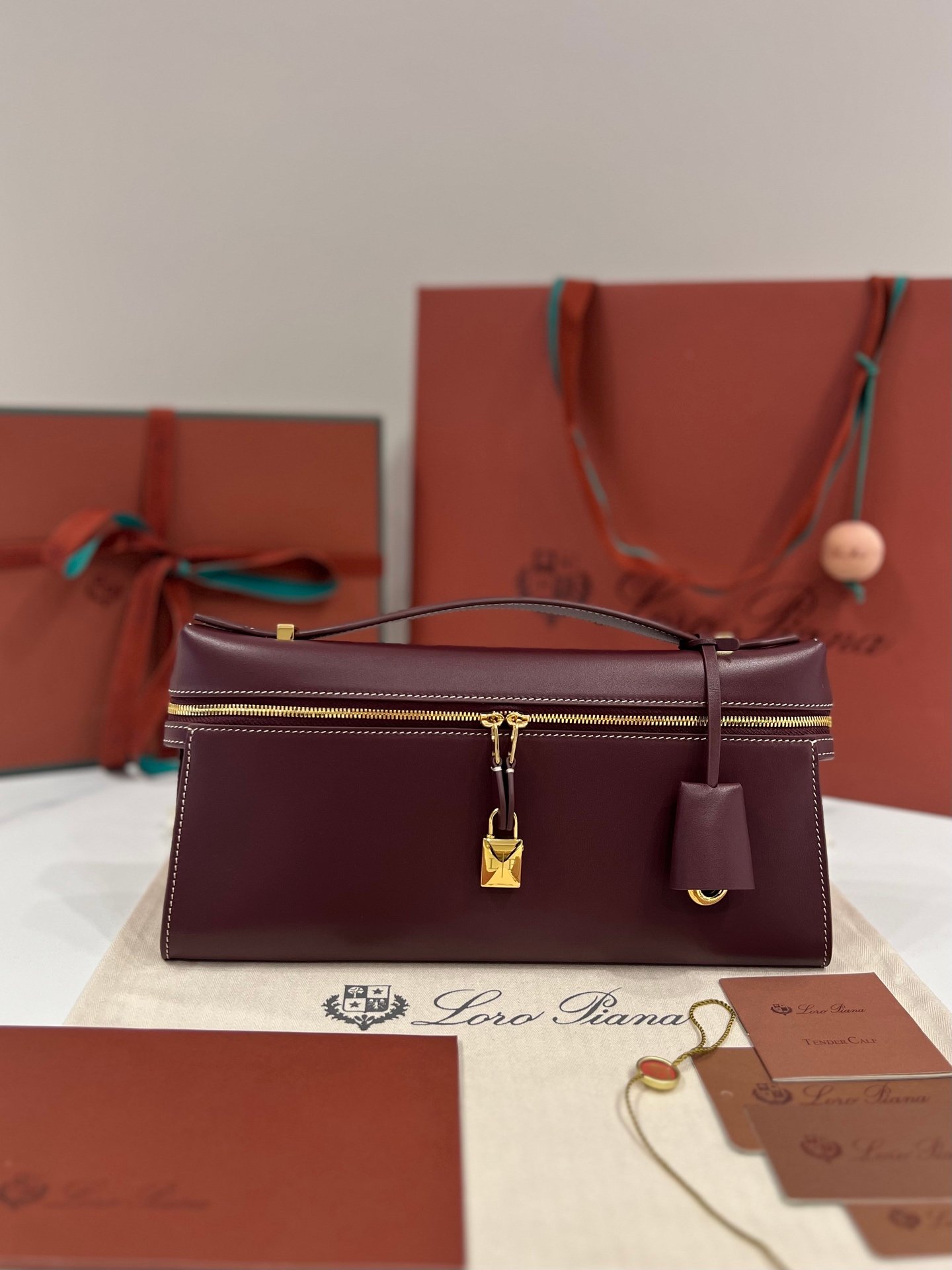 Loro Piana Extra L29 Clutch Bag 29cm Saddle Leather Elegant Handmade Designer Leather Handheld Purse with Signature Gold Padlock