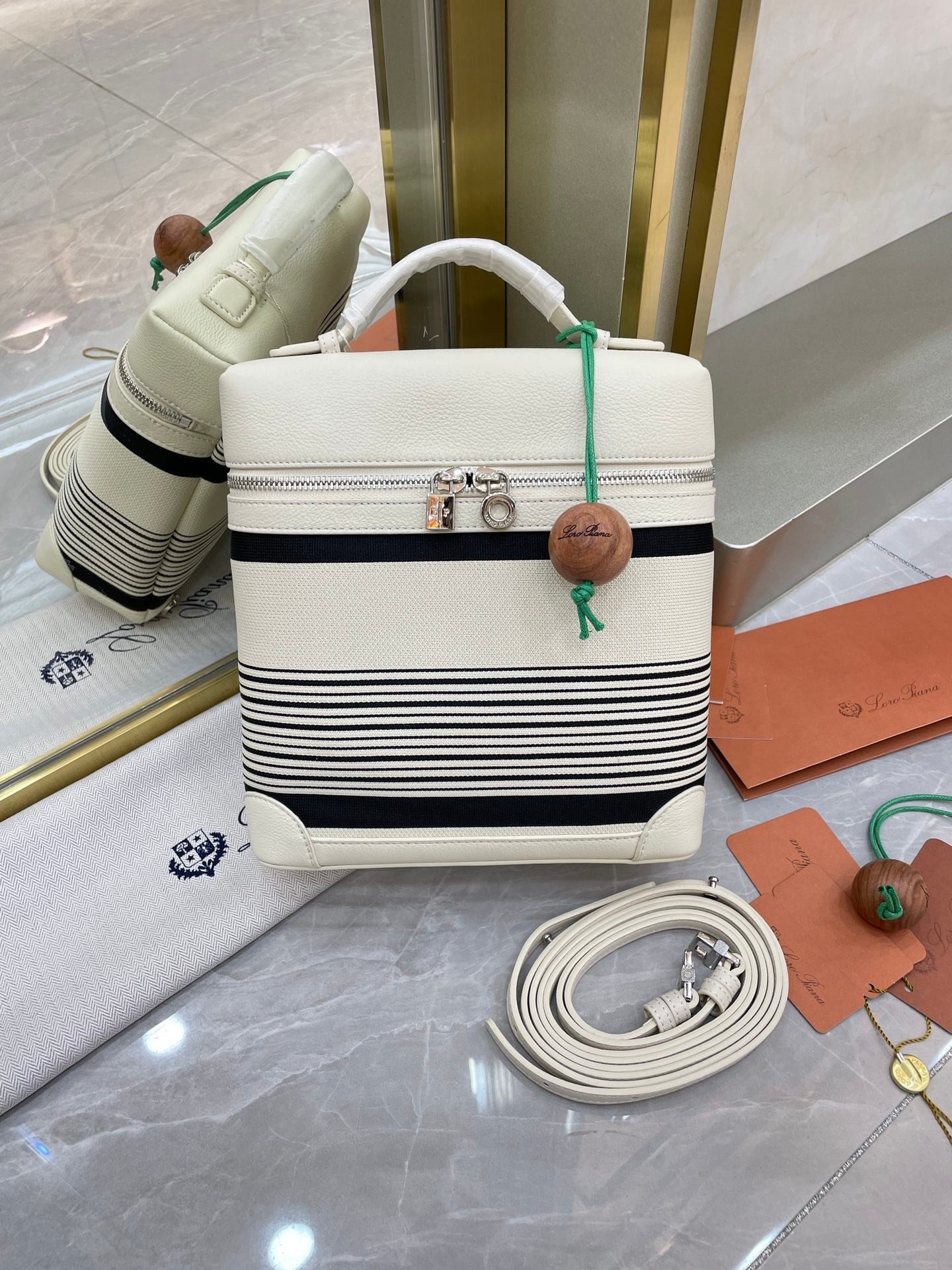 Loro Piana L23.5 Extra Pocket Backpack Striped Canvas Calfskin Leather Mini Bag Versatile 2-Way Top Handle Convertible Shoulder Bag Loro Piana L23.5 Extra Pocket Backpack Striped Canvas Calfskin Leather Mini Bag Versatile 2-Way Top Handle Convertible Shoulder Bag