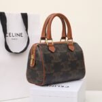 Celine Triomphe Canvas Small Boston Bag 19.5cm Vintage-Inspired Luxury Pillow Bag with Italian Leather Trim 2