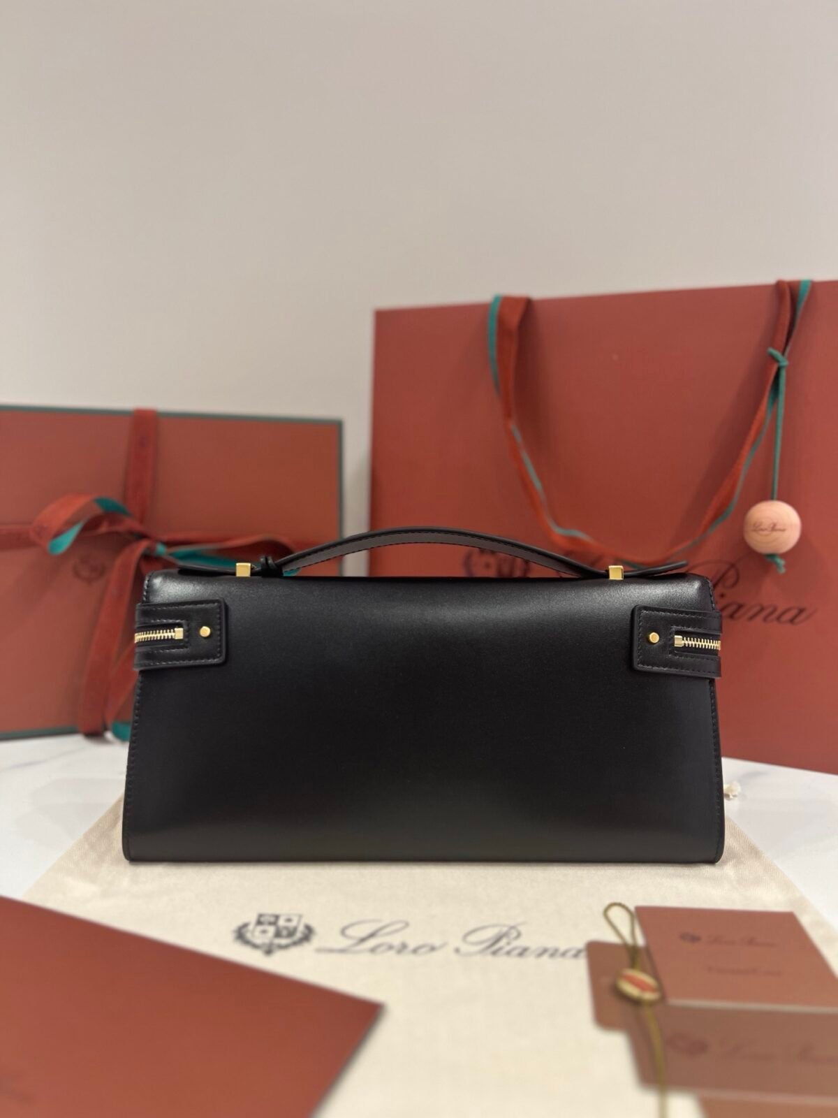 Loro Piana Extra L29 Clutch Bag 29cm Saddle Leather Elegant Handmade Designer Leather Handheld Purse with Signature Gold Padlock