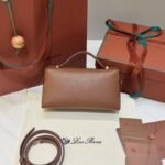 Loro Piana Extra Bag L23 Calfskin Leather Top Handle Bag 23cm Crossbody Handbag with Signature Padlock Charms and Adjustable Strap Loro Piana Extra Bag L23 Calfskin Leather Top Handle Bag 23cm Crossbody Handbag with Signature Padlock Charms and Adjustable Strap