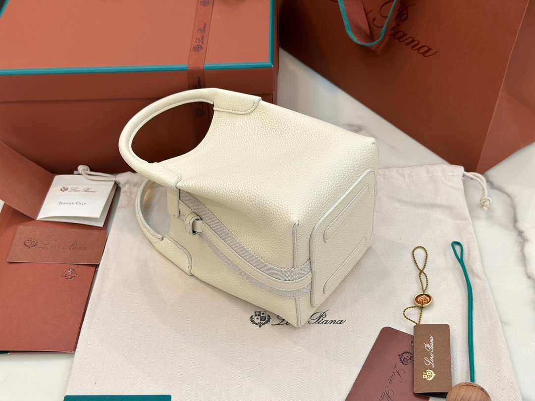 Loro Piana Bale Mini Bucket Bag Grained Calfskin Sophisticated Shoulder and Crossbody Handbag Craftsmanship and Versatile Luxury Loro Piana Bale Mini Bucket Bag Grained Calfskin Sophisticated Shoulder and Crossbody Handbag Craftsmanship and Versatile Luxury