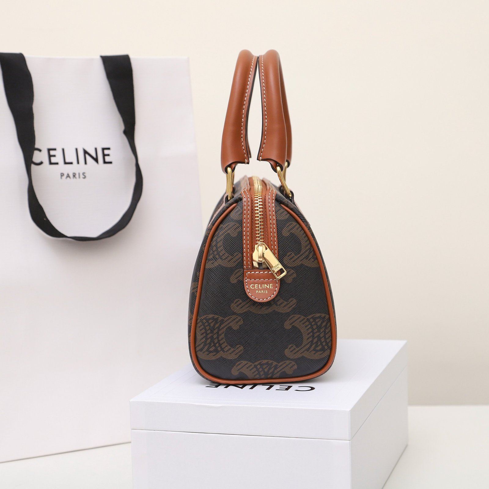 Celine Triomphe Canvas Small Boston Bag 19.5cm Vintage-Inspired Luxury Pillow Bag with Italian Leather Trim 3