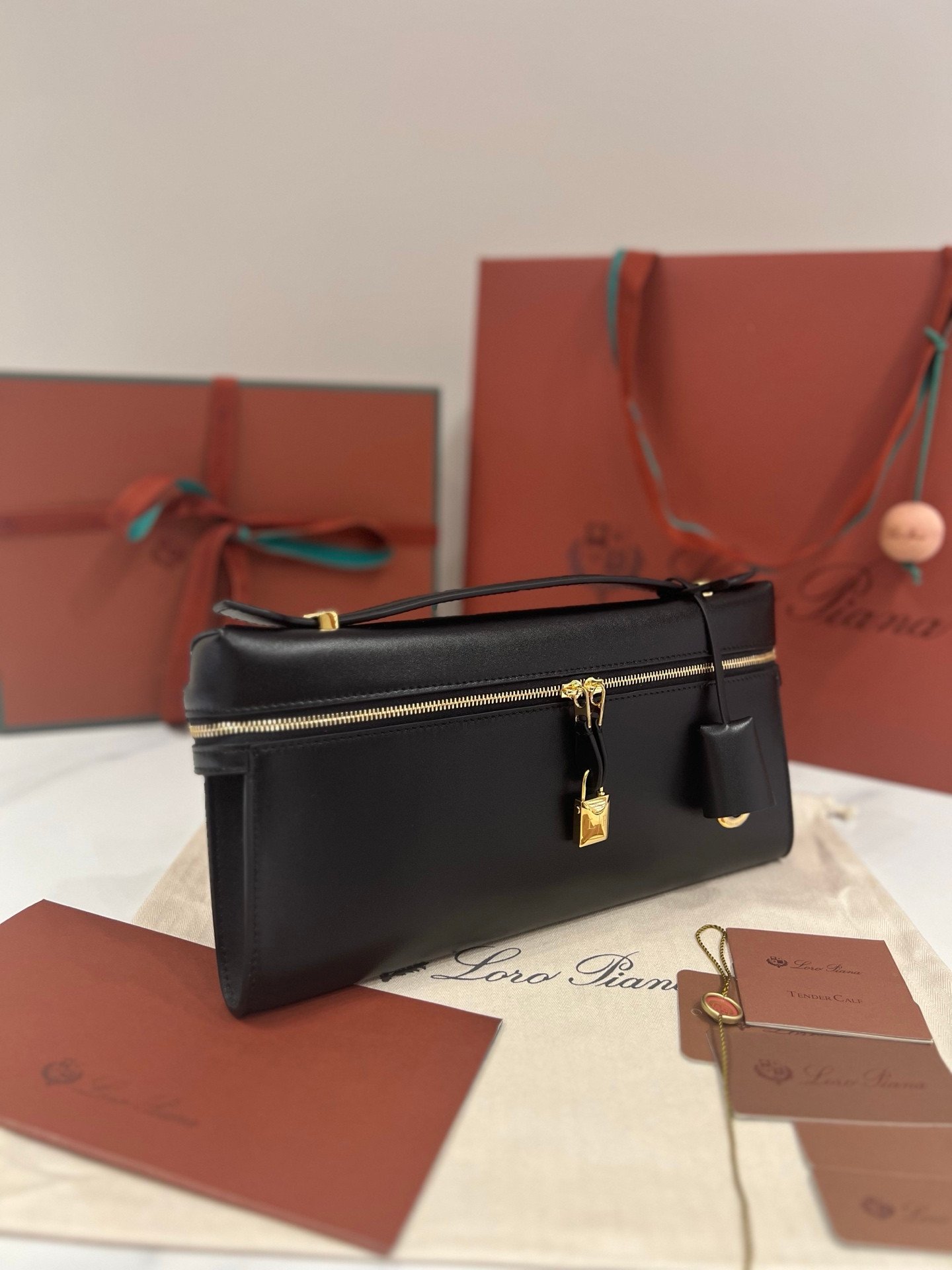 Loro Piana Extra L29 Clutch Bag 29cm Saddle Leather Elegant Handmade Designer Leather Handheld Purse with Signature Gold Padlock
