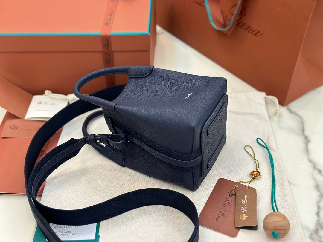 Loro Piana Bale Mini Bucket Bag Grained Calfskin Sophisticated Shoulder and Crossbody Handbag Craftsmanship and Versatile Luxury Loro Piana Bale Mini Bucket Bag Grained Calfskin Sophisticated Shoulder and Crossbody Handbag Craftsmanship and Versatile Luxury
