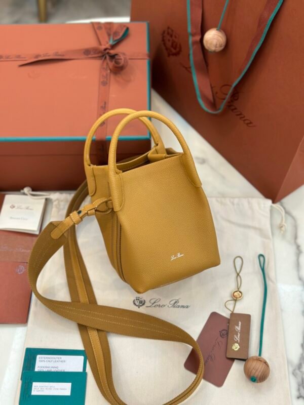 46 Loro Piana Bale Mini Bucket Bag Grained Calfskin Sophisticated Shoulder and Crossbody Handbag Craftsmanship and Versatile Luxury