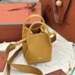 Loro Piana Bale Mini Bucket Bag Grained Calfskin Sophisticated Shoulder and Crossbody Handbag Craftsmanship and Versatile Luxury Loro Piana Bale Mini Bucket Bag Grained Calfskin Sophisticated Shoulder and Crossbody Handbag Craftsmanship and Versatile Luxury