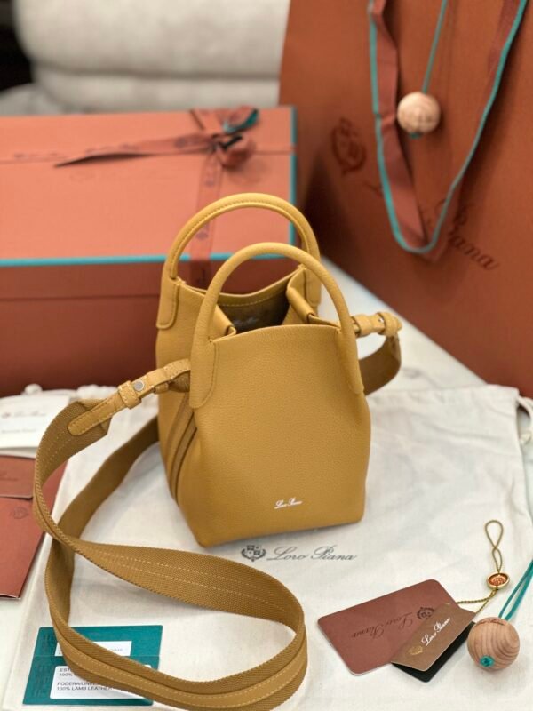 47 Loro Piana Bale Mini Bucket Bag Grained Calfskin Sophisticated Shoulder and Crossbody Handbag Craftsmanship and Versatile Luxury