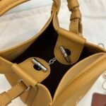 Loro Piana Bale Mini Bucket Bag Grained Calfskin Sophisticated Shoulder and Crossbody Handbag Craftsmanship and Versatile Luxury Loro Piana Bale Mini Bucket Bag Grained Calfskin Sophisticated Shoulder and Crossbody Handbag Craftsmanship and Versatile Luxury