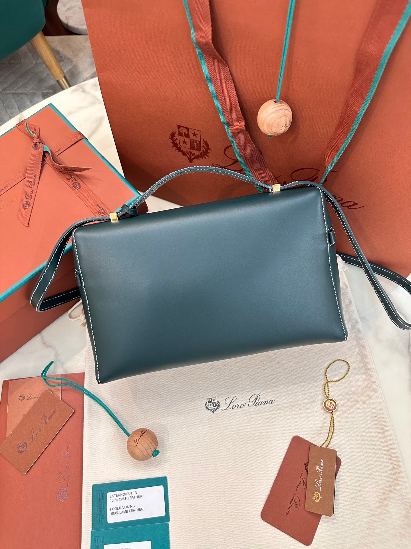 Loro Piana L27 Extra Bag 27 Minimalist Quiet Luxury Leather Tote Bag Structured Calfskin Crossbody Bag with Signature Padlock Loro Piana L27 Extra Bag 27 Minimalist Quiet Luxury Leather Tote Bag Structured Calfskin Crossbody Bag with Signature Padlock