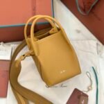 Loro Piana Bale Mini Bucket Bag Grained Calfskin Sophisticated Shoulder and Crossbody Handbag Craftsmanship and Versatile Luxury Loro Piana Bale Mini Bucket Bag Grained Calfskin Sophisticated Shoulder and Crossbody Handbag Craftsmanship and Versatile Luxury