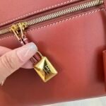 Loro Piana L27 Extra Bag 27 Minimalist Quiet Luxury Leather Tote Bag Structured Calfskin Crossbody Bag with Signature Padlock Loro Piana L27 Extra Bag 27 Minimalist Quiet Luxury Leather Tote Bag Structured Calfskin Crossbody Bag with Signature Padlock