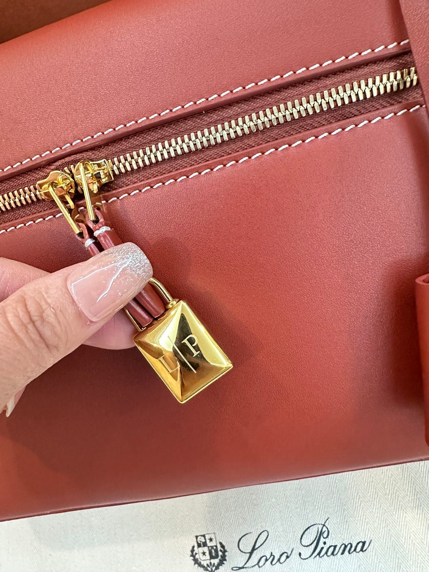 Loro Piana L27 Extra Bag 27 Minimalist Quiet Luxury Leather Tote Bag Structured Calfskin Crossbody Bag with Signature Padlock Loro Piana L27 Extra Bag 27 Minimalist Quiet Luxury Leather Tote Bag Structured Calfskin Crossbody Bag with Signature Padlock