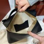 Loro Piana L23 Extra Handbag 23cm Black Textured Leather Minimalist Shoulder Bag with Gold Hardware and Gift Box Loro Piana L23 Extra Handbag 23cm Black Textured Leather Minimalist Shoulder Bag with Gold Hardware and Gift Box