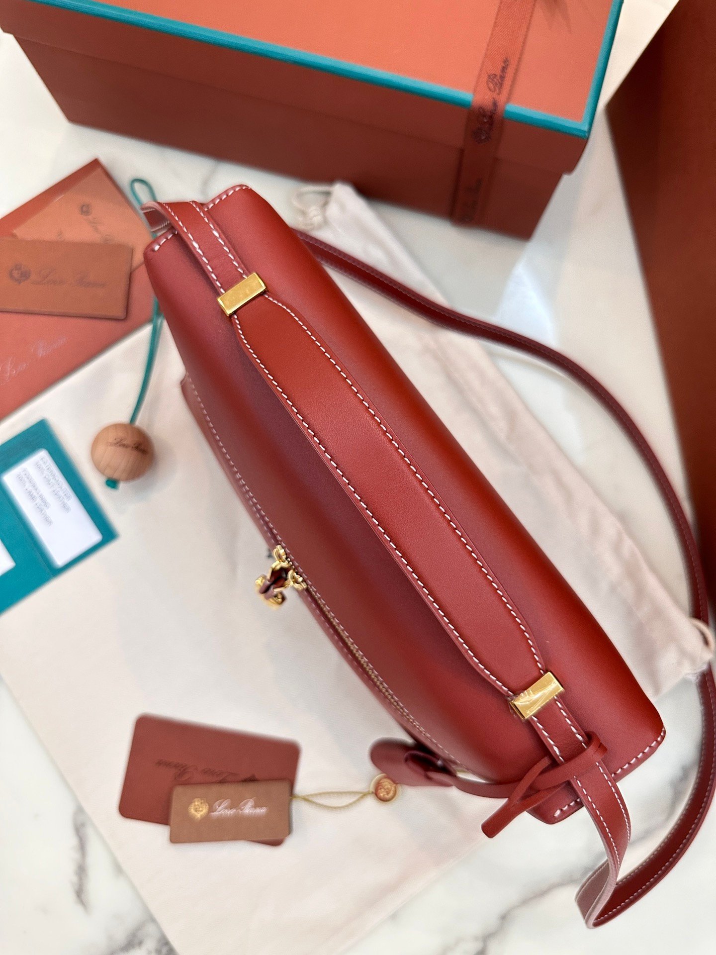 Loro Piana L27 Extra Bag 27 Minimalist Quiet Luxury Leather Tote Bag Structured Calfskin Crossbody Bag with Signature Padlock Loro Piana L27 Extra Bag 27 Minimalist Quiet Luxury Leather Tote Bag Structured Calfskin Crossbody Bag with Signature Padlock