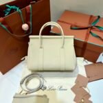 Loro Piana Loom L25 Handbag 25cm Tender Calfskin Leather Top-Handle Bag with Crossbody Strap and Iconic Padlock
