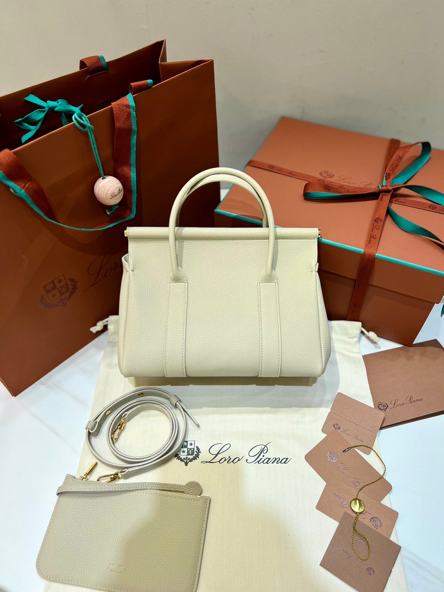 Loro Piana Loom L25 Handbag 25cm Tender Calfskin Leather Top-Handle Bag with Crossbody Strap and Iconic Padlock