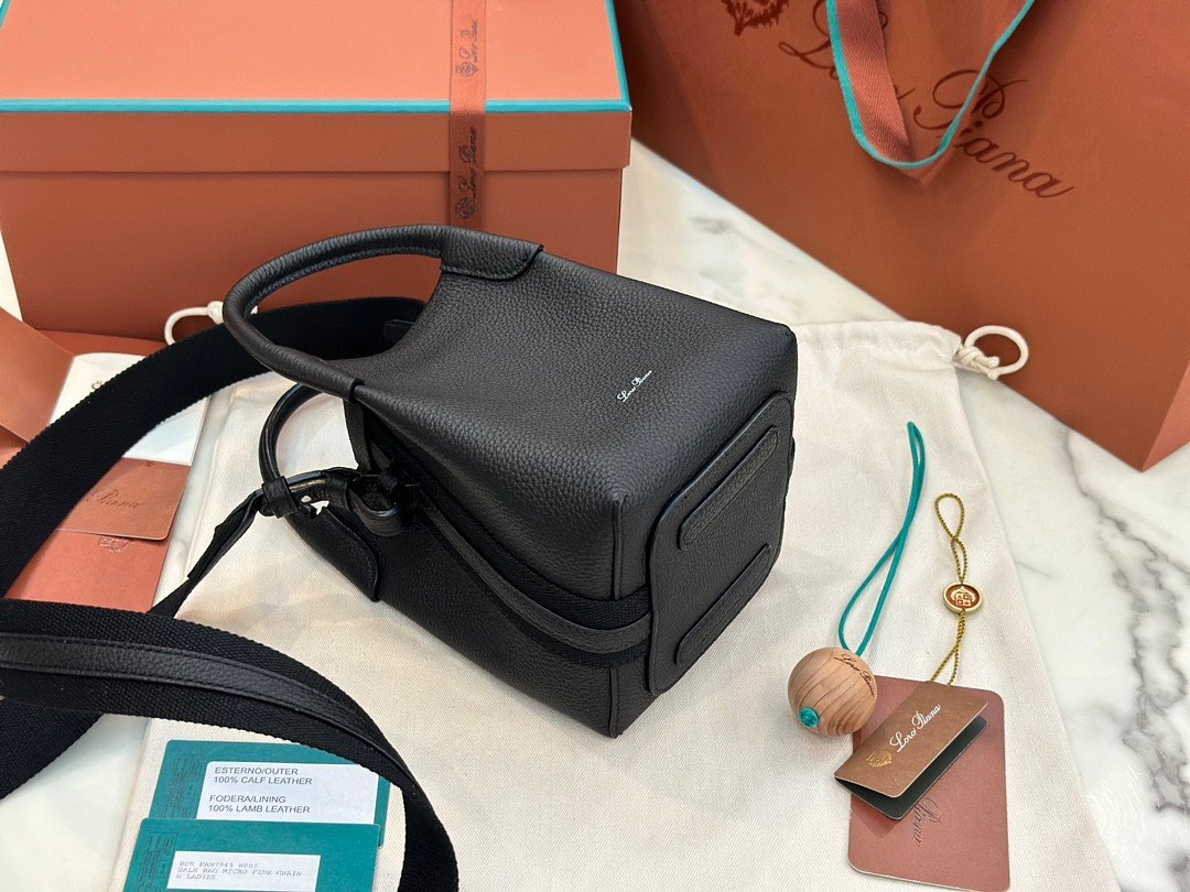 Loro Piana Bale Mini Bucket Bag Grained Calfskin Sophisticated Shoulder and Crossbody Handbag Craftsmanship and Versatile Luxury Loro Piana Bale Mini Bucket Bag Grained Calfskin Sophisticated Shoulder and Crossbody Handbag Craftsmanship and Versatile Luxury