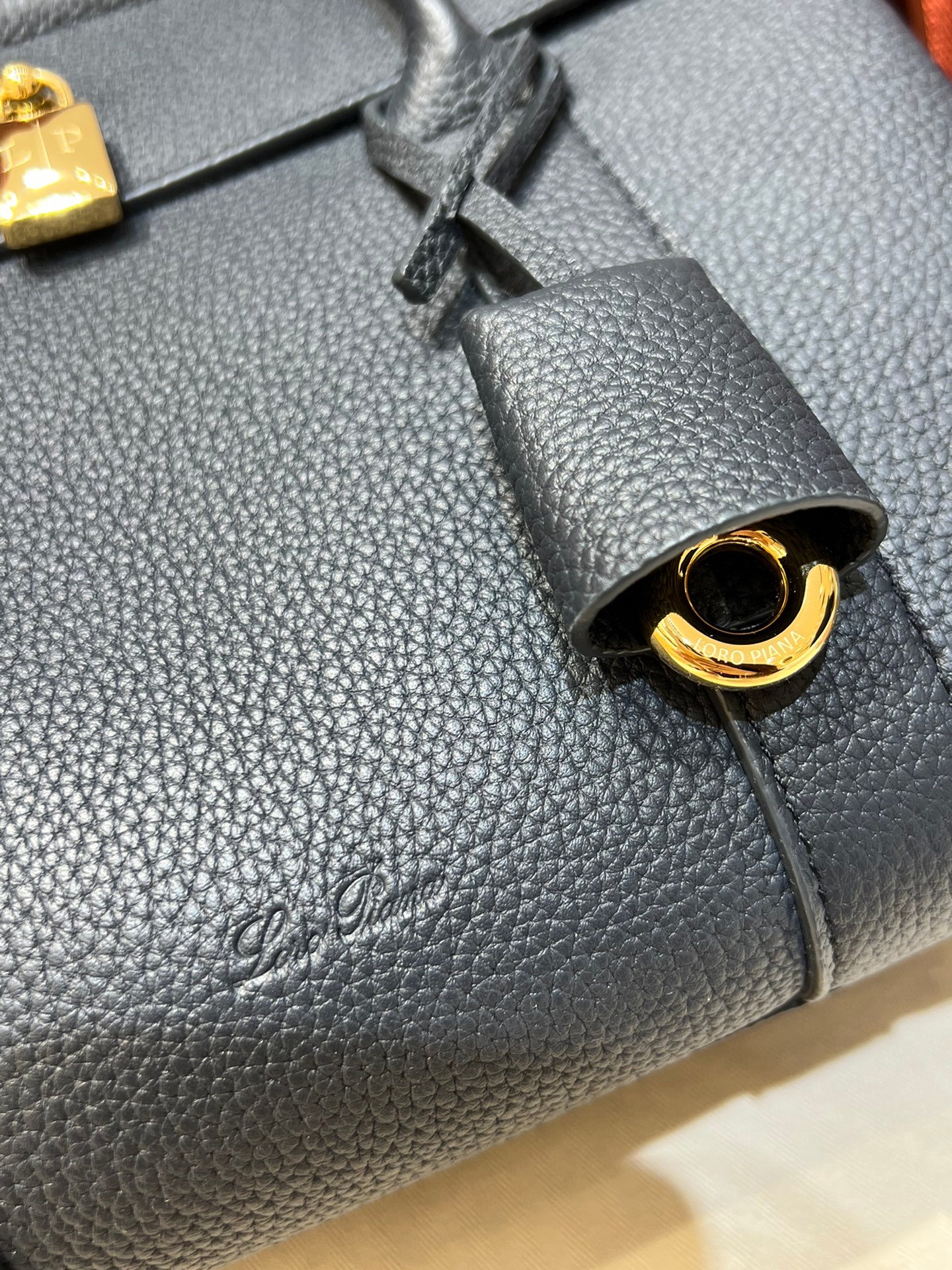Loro Piana Loom L25 Handbag 25cm Tender Calfskin Leather Top-Handle Bag with Crossbody Strap and Iconic Padlock